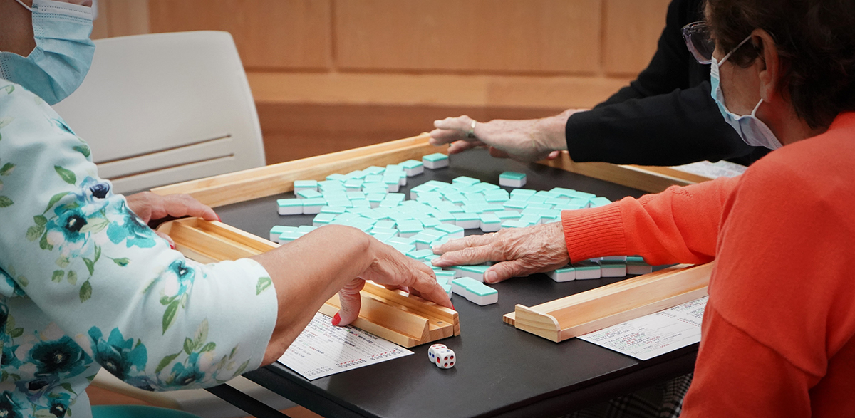 People playing Mah Jong