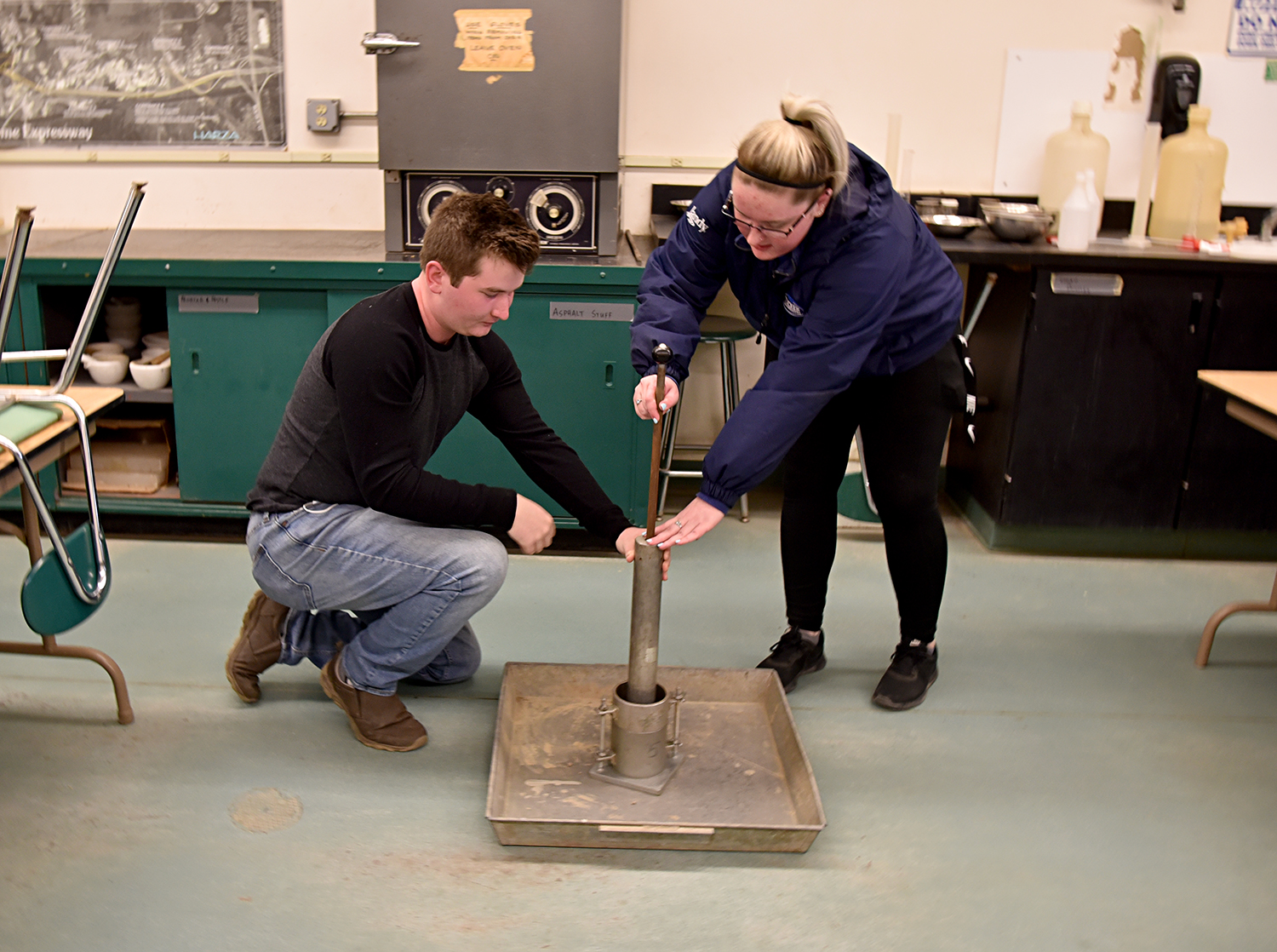 Students in the CET program doing testing