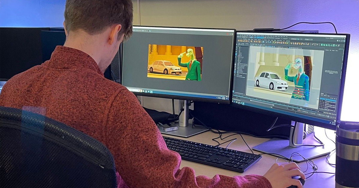 Image of student working on digital artwork on computer