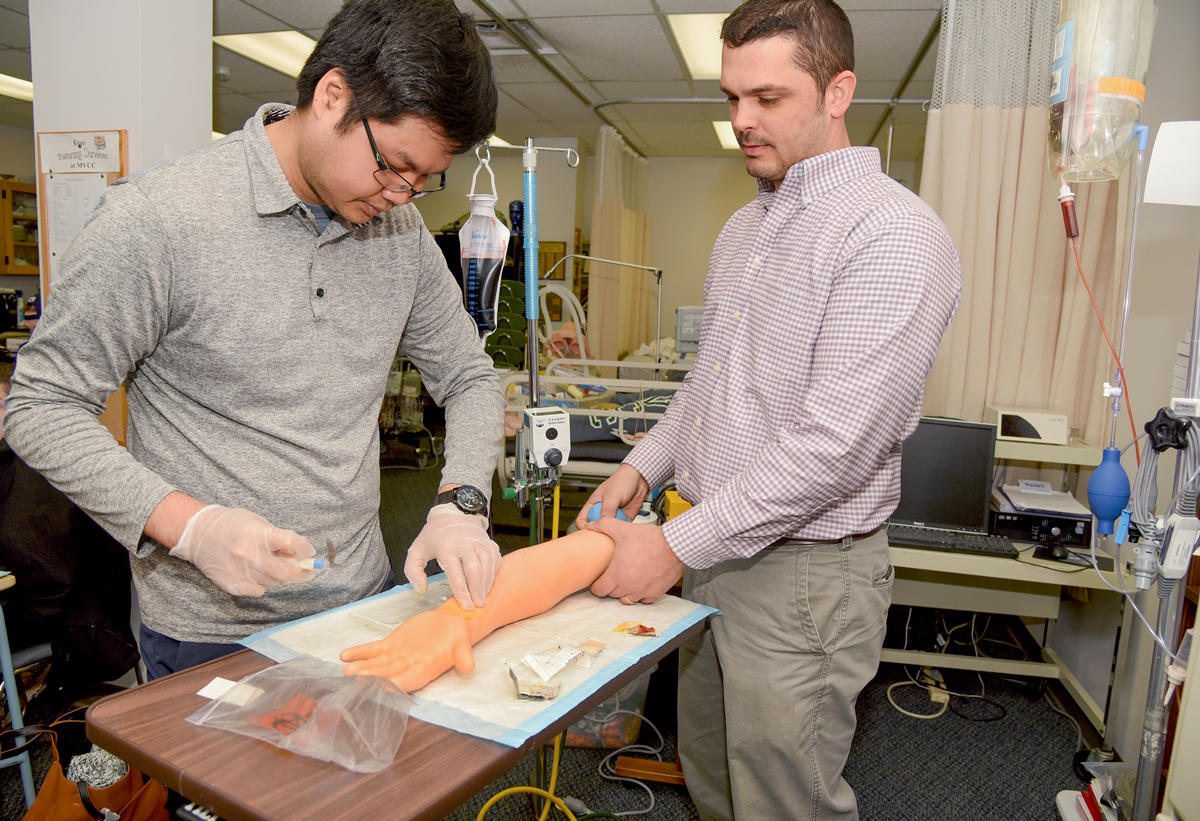 Respiratory Care student working with instructor