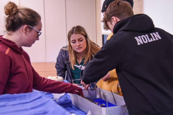 Student working in the Surg Tech lab