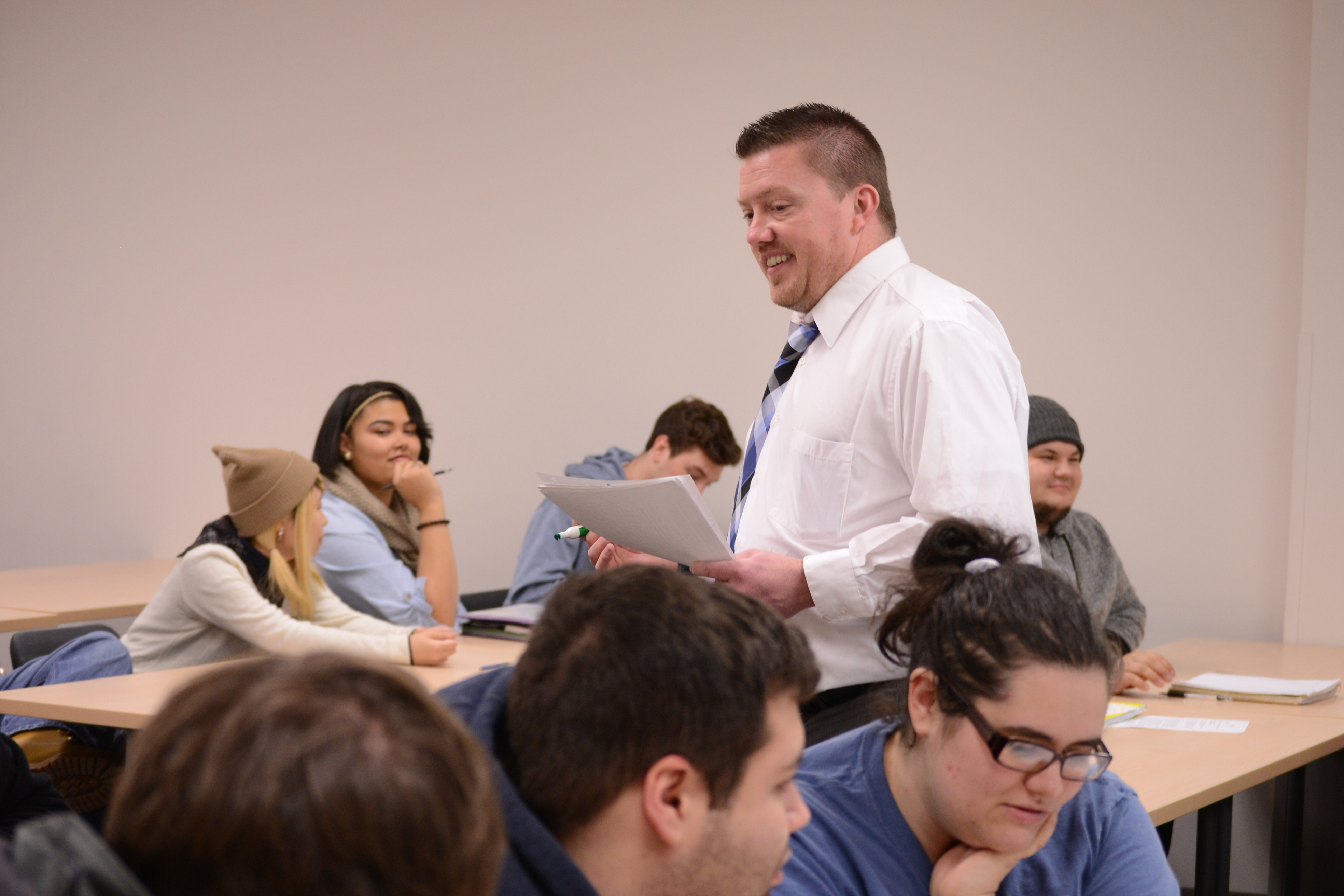 Professor talking to students in class