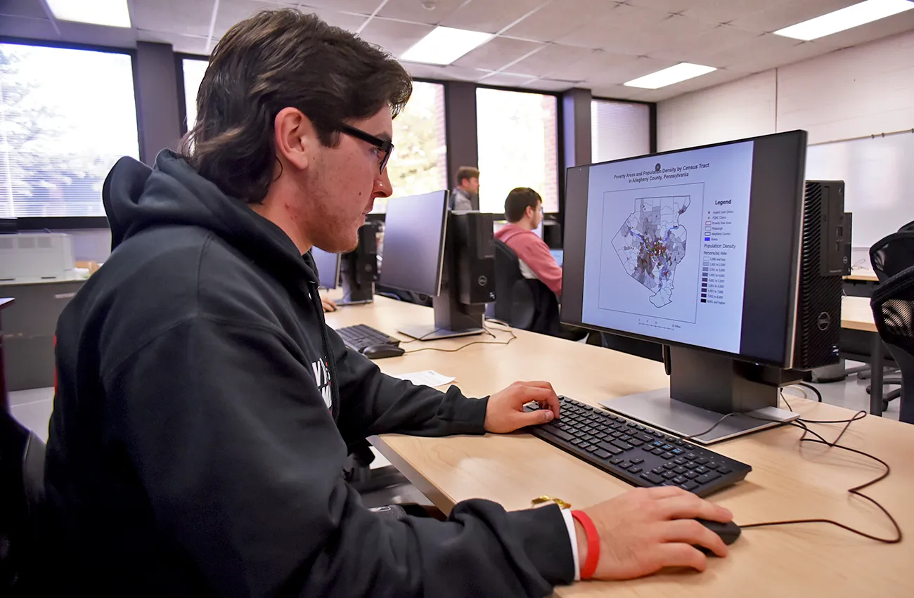Student using computer in class