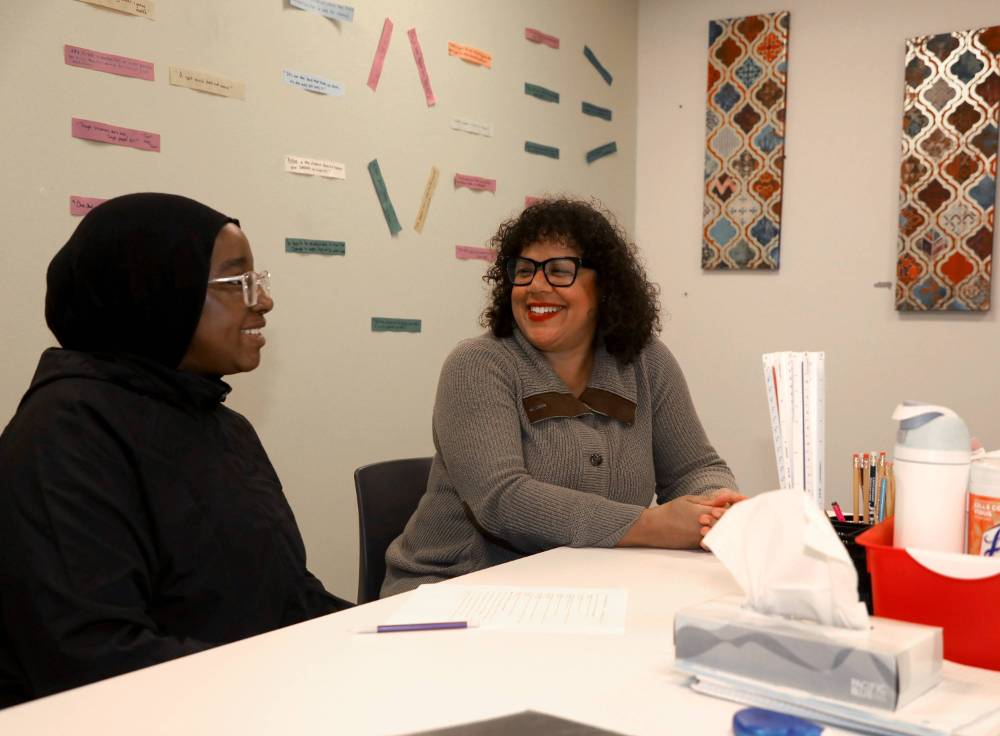 EOP Director with Student in lab