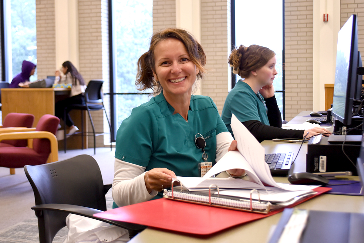 Picture of Nursing Student in Library