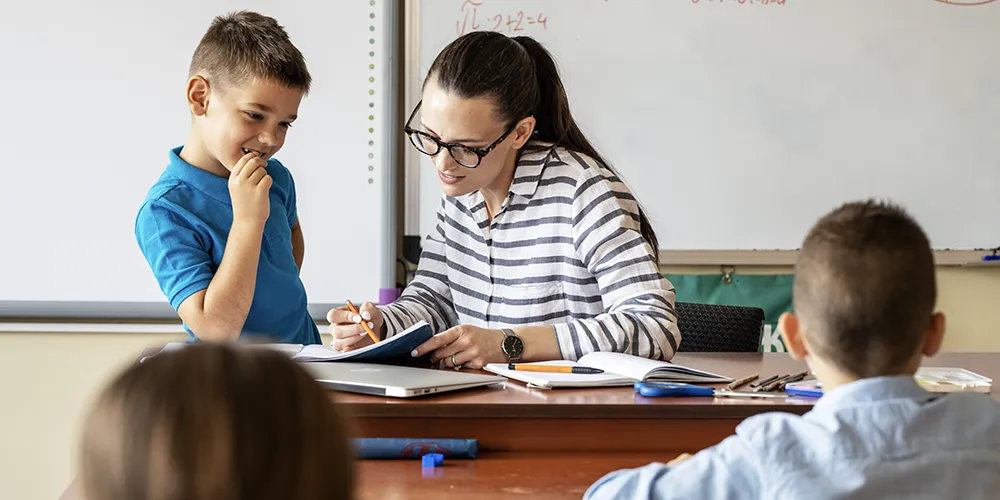 Teaching young students in classroom