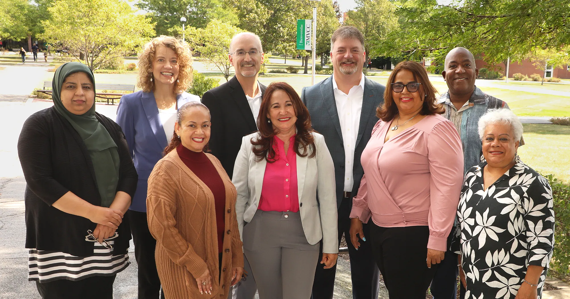 Image of nine people standing together on the MVCC Campus