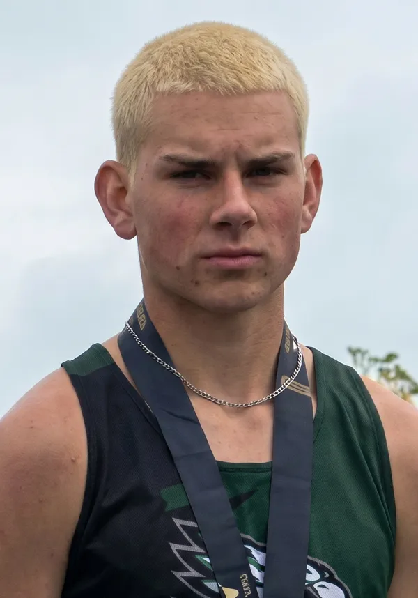 Image of person wearing sports medals