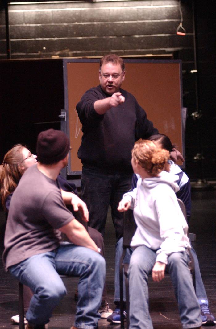 Image of Late Professor Paul Cruskie teaching Theater students on stage