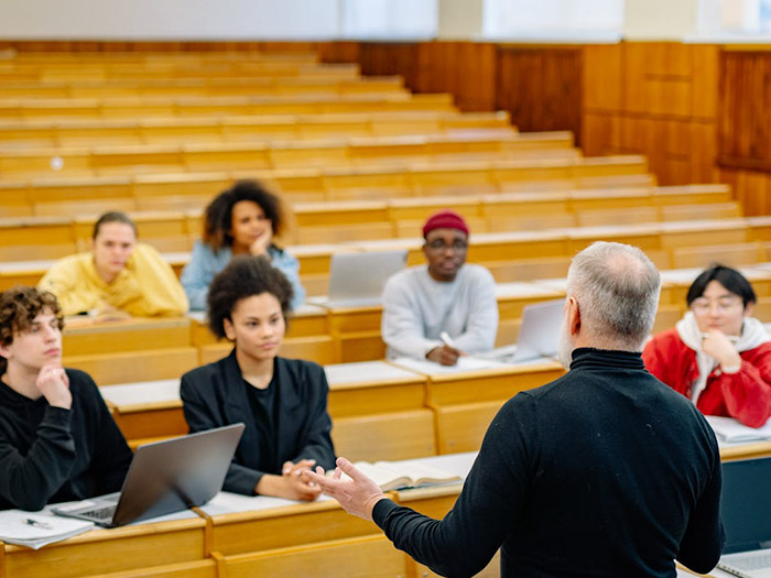 image of professor teaching a class