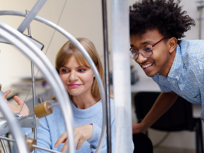 two students smiling